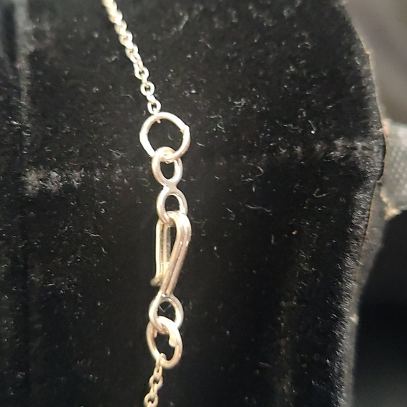 Silver color necklace unclip is 20 inch long, close is 9 1/2 inch long. - Picture 5 of 5